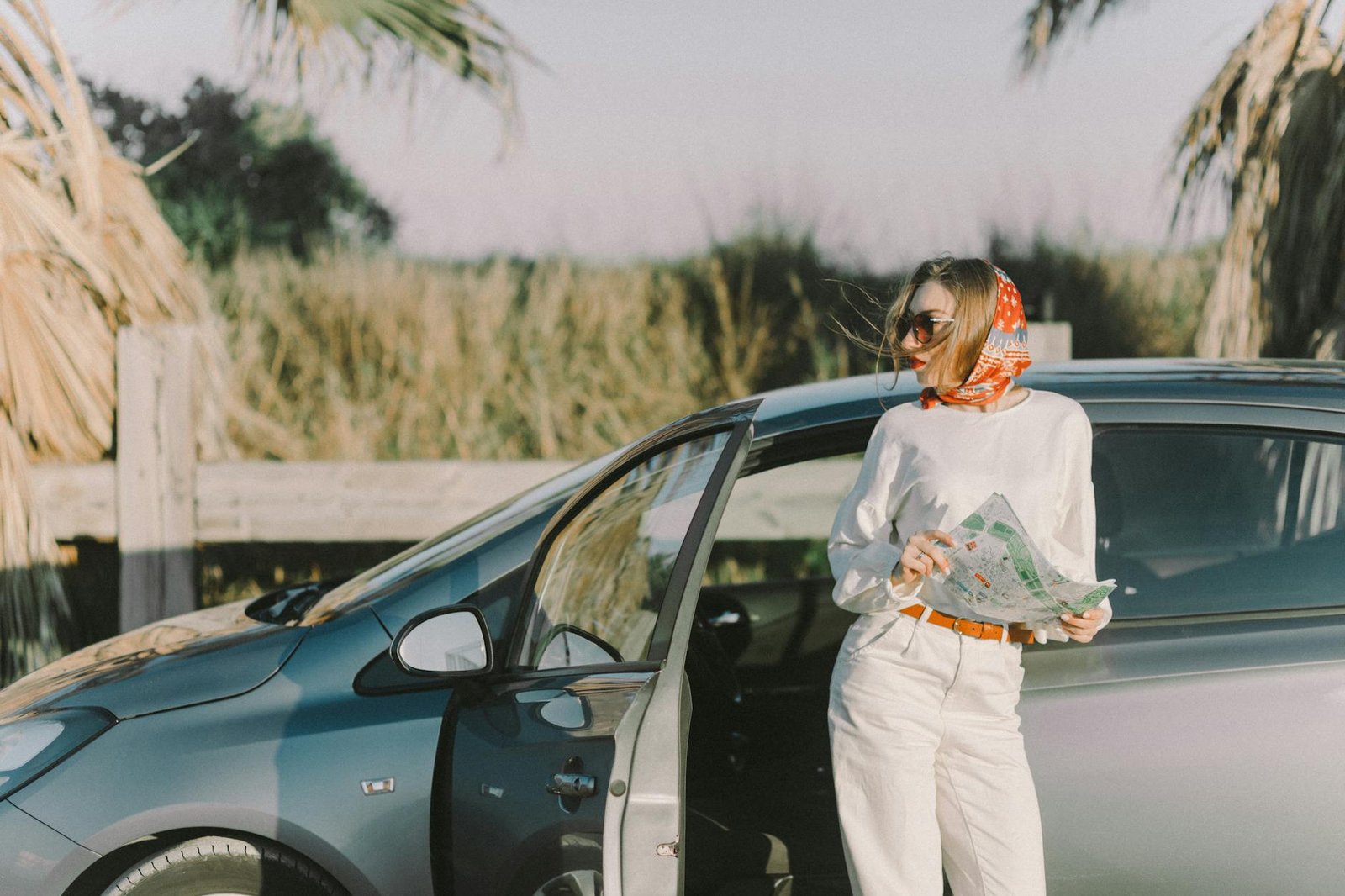 A Stylish Woman Holding a Map